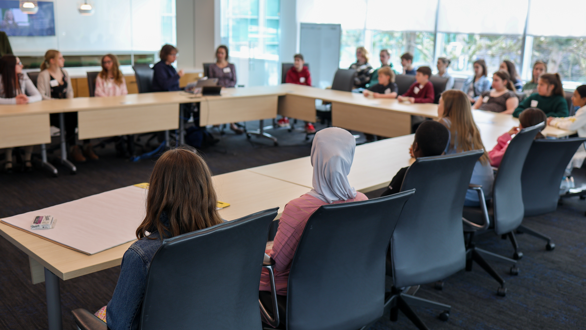 Students in a discussion room.