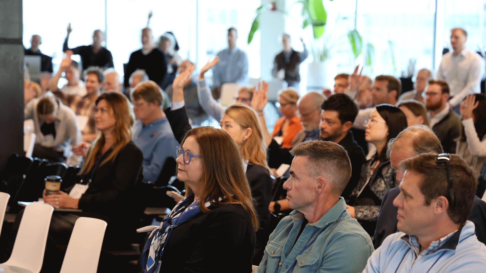 Attendees engage with a panel.