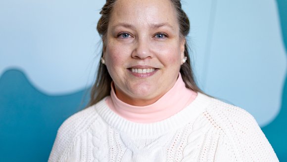 Headshot of Hilary Beveridge.