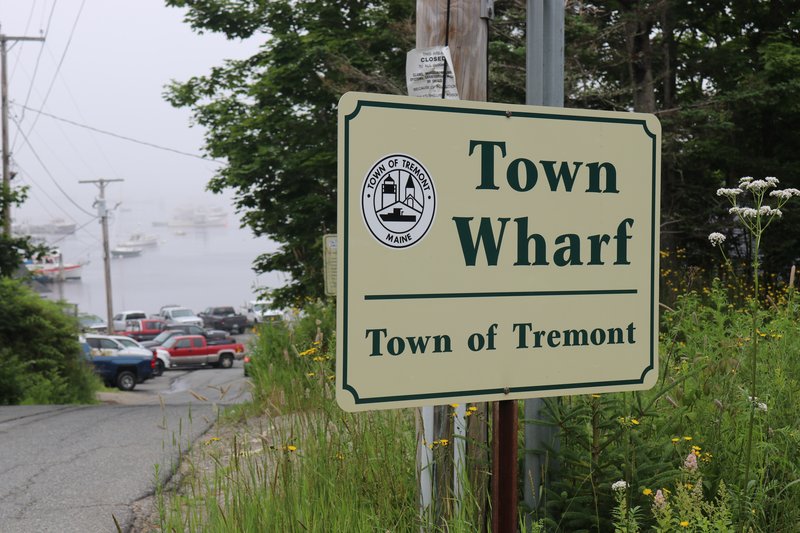 A sign showing the Town of Tremont's wharf.