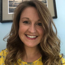 This is a portrait of a woman smiling.