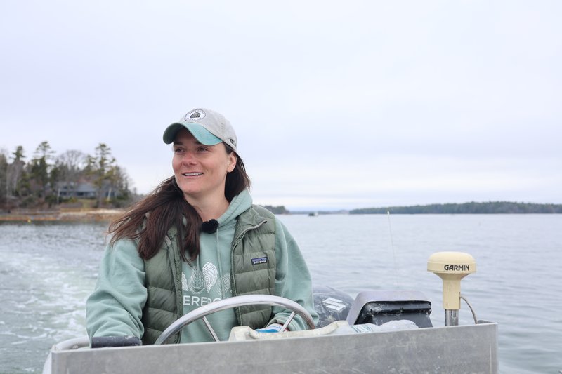 Kat Lipp captaining a boat.