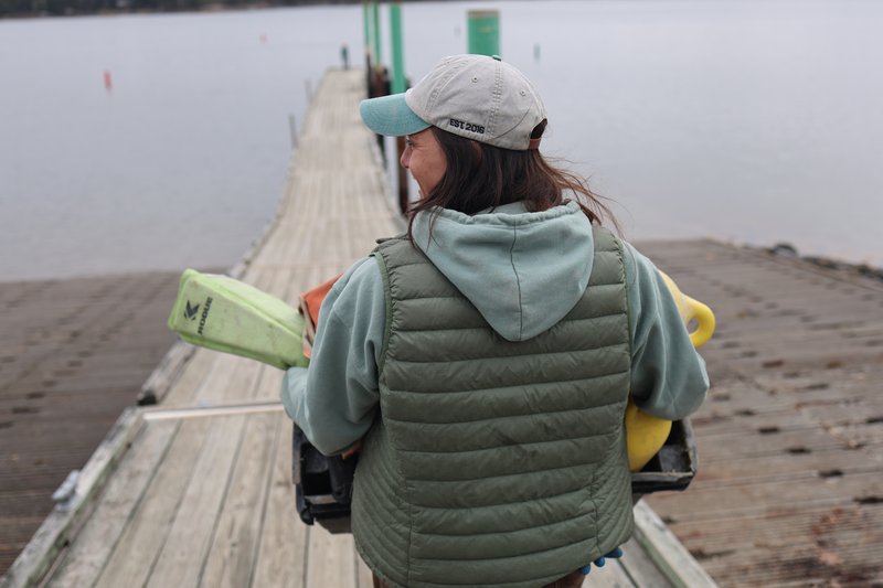 Kat Lipp walking down a dock.