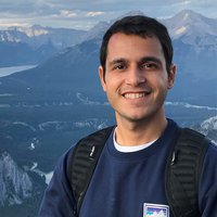 A portrait of a man smiling.