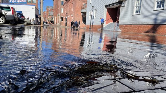 Barely a cloud in the sky and Portland, Maine, is flooding