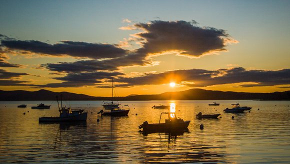 Boats in sunset on the coast