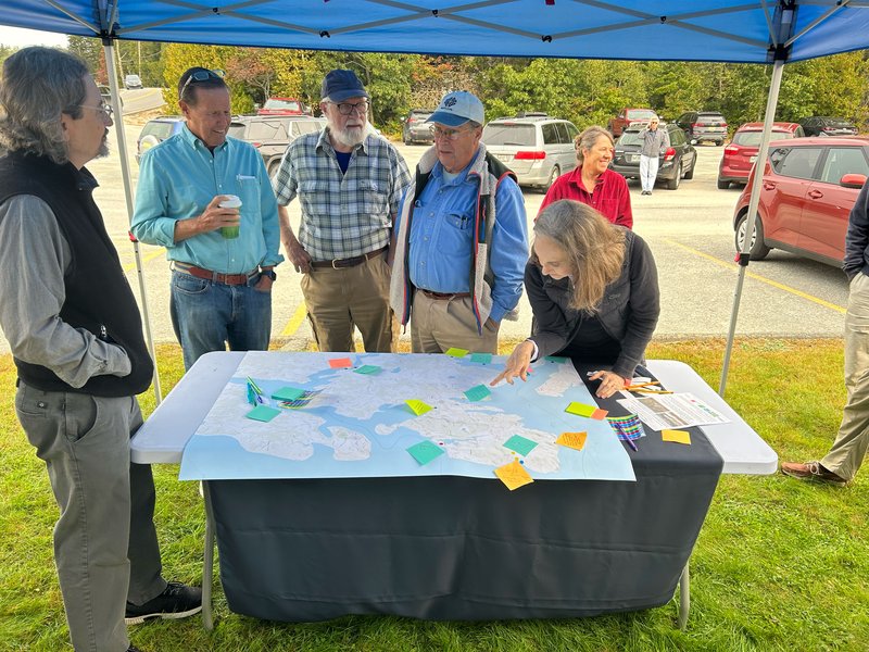 People looking at a map.
